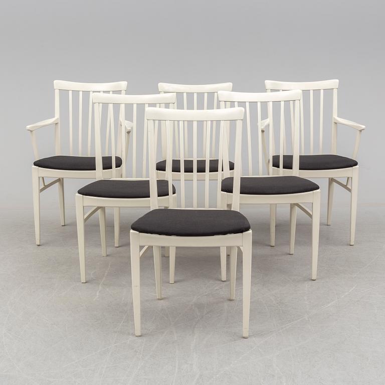 A dining table with six chairs by Carl Malmsten, Bodafors, 1960s.
