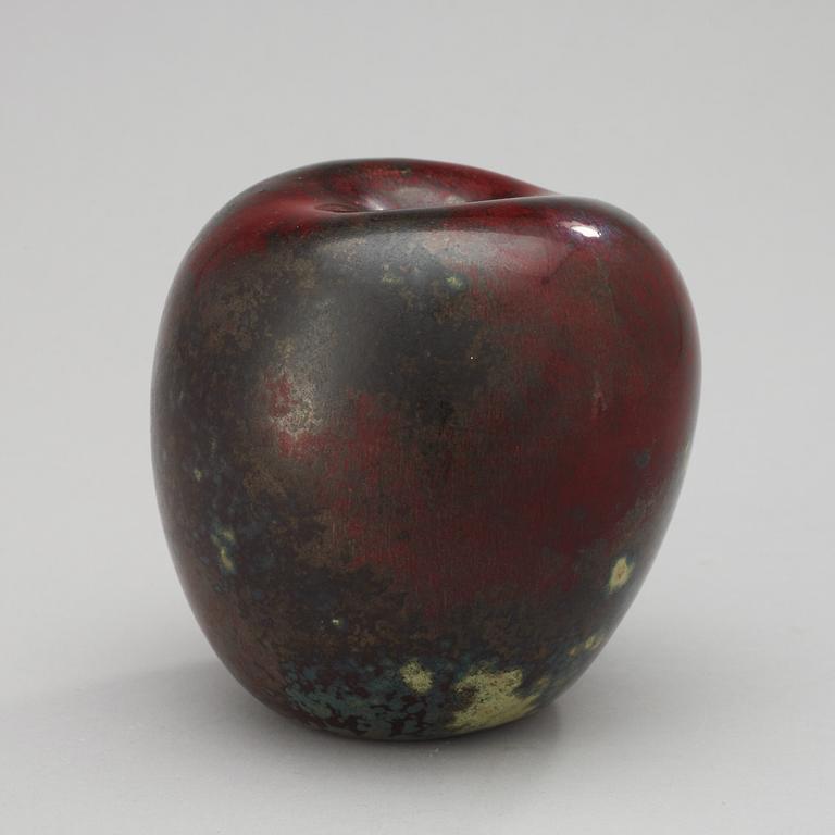 A Hans Hedberg faience apple, Biot, France.