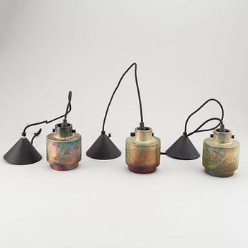 Tom Dixon, a set of three stoneware “Lustre pendants”.