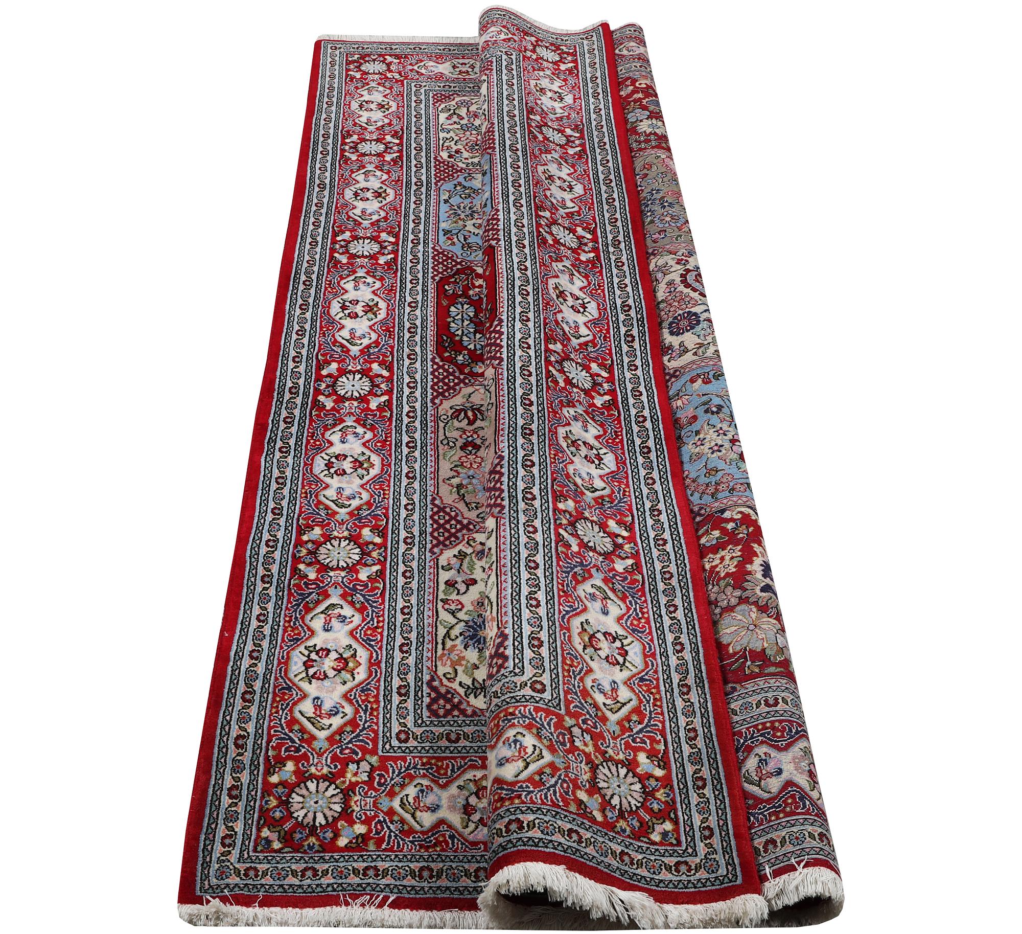 A Quum carpet, c. 250 x 150 cm.