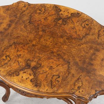 A rococo style center table, second half of the 19th Century.