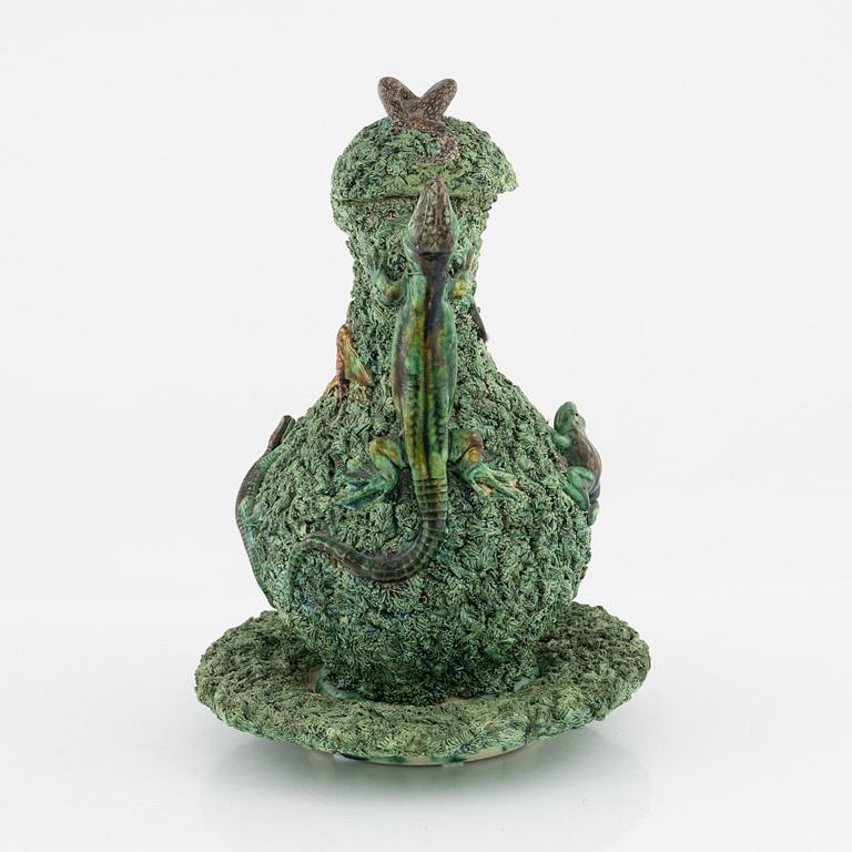 A majolica ewer with cover and stand, M. Mafra, Caldao, Portugal, late 19th Century.