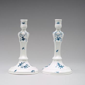 A pair of Berlin porcelain candle sticks, 18th Century.