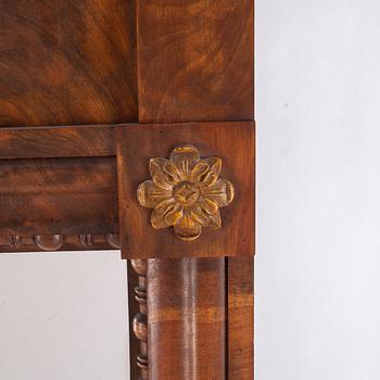 A mirror and console table, first half of the 19th century.
