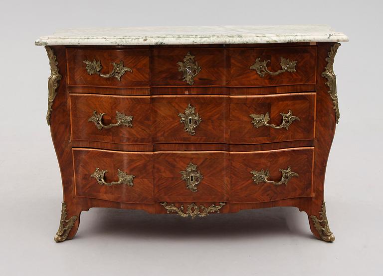 A Swedish early Rococo mid 18th century commode attributed to Olof Martin, master 1736-1764.