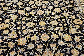 A Kashan carpet, c. 363 x 247 cm.