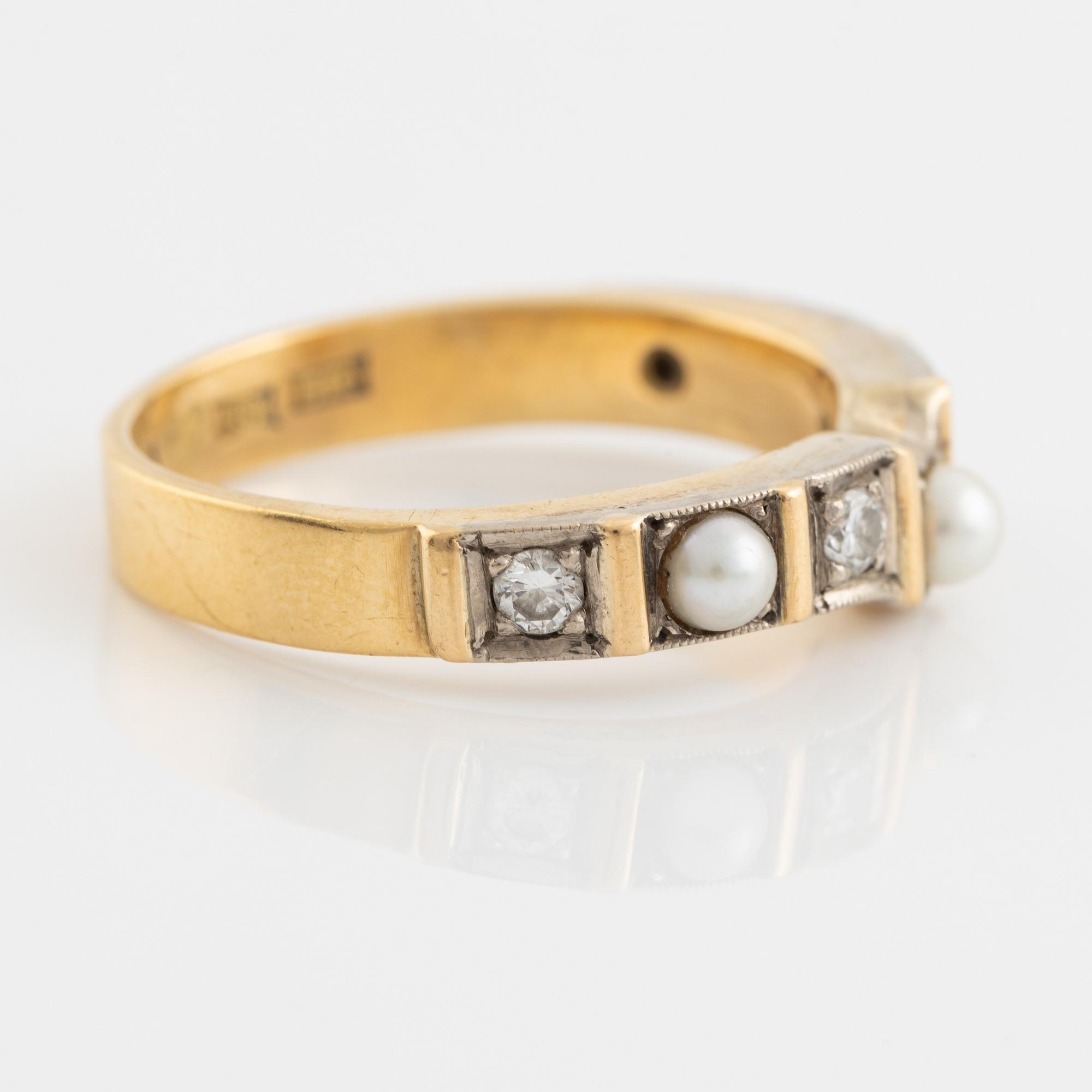An 18K gold ring set with cultured pearls and round brilliant-cut diamonds.