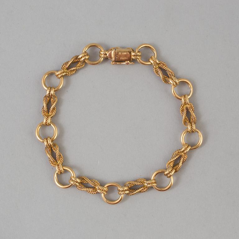 HERMÈS armband i 18K guld.