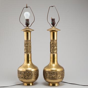 A pair of Chinese brass table lamps, 20th century.