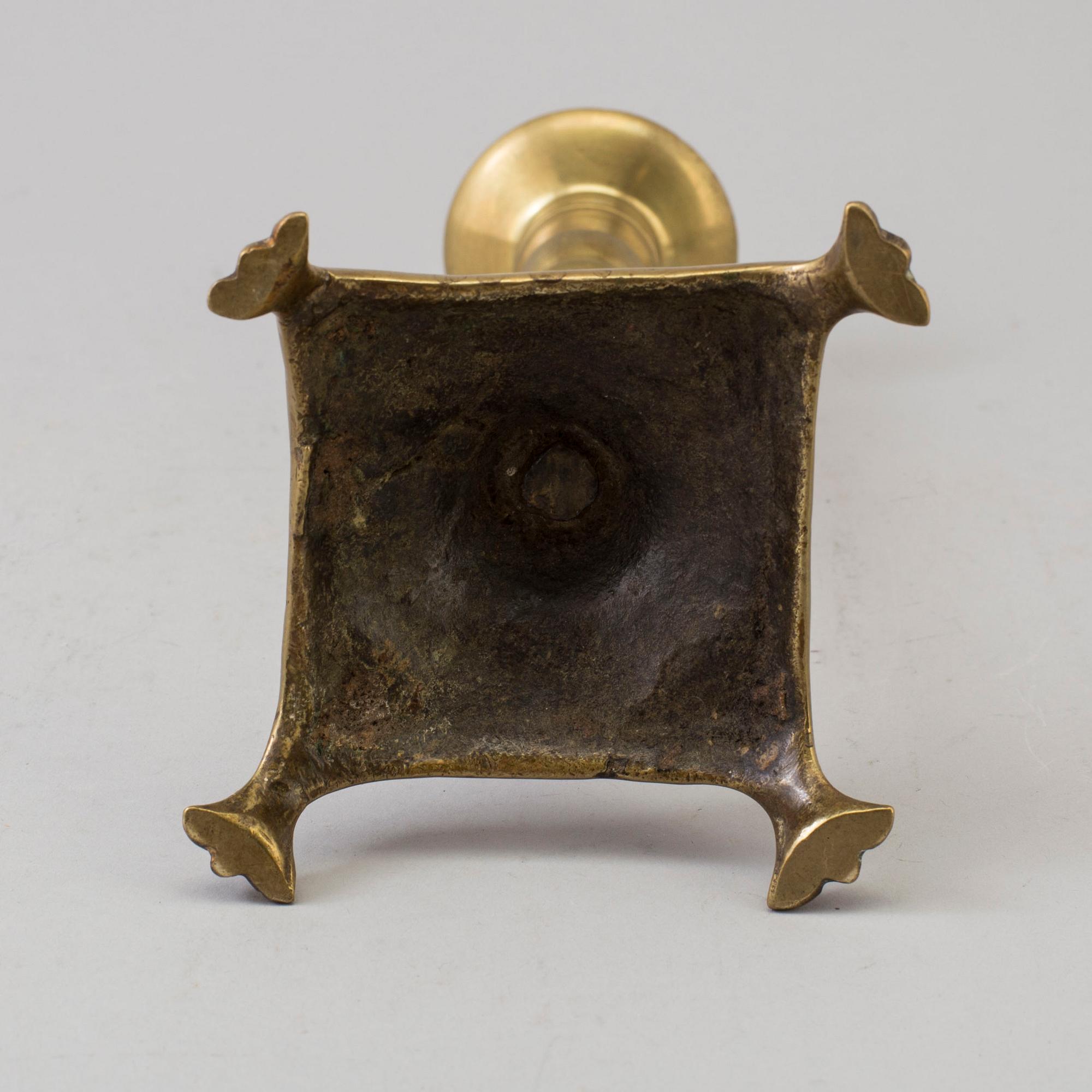 A BRONZE CANDLESTICK, 17th/18th century.