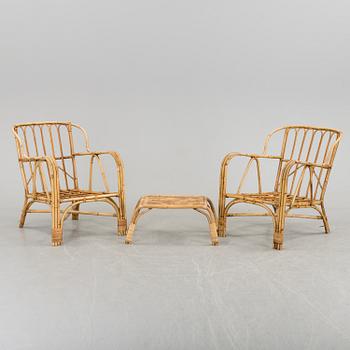 A pair of Garden Armchairs with one stool, mid 20th century.