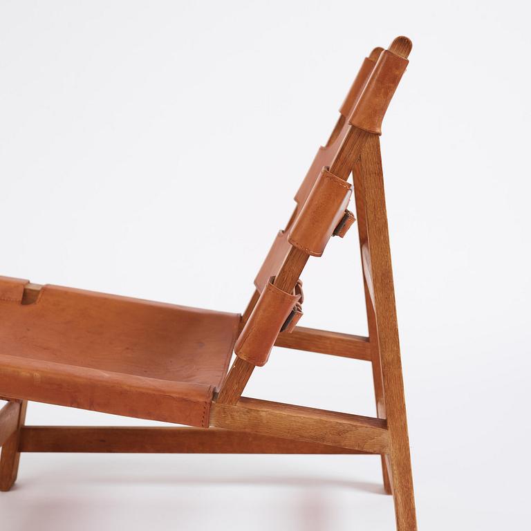 Børge Mogensen, an oak and natural brown leather easy chair model "2224", Fredericia Stolefabrik, Denmark, 1960s.