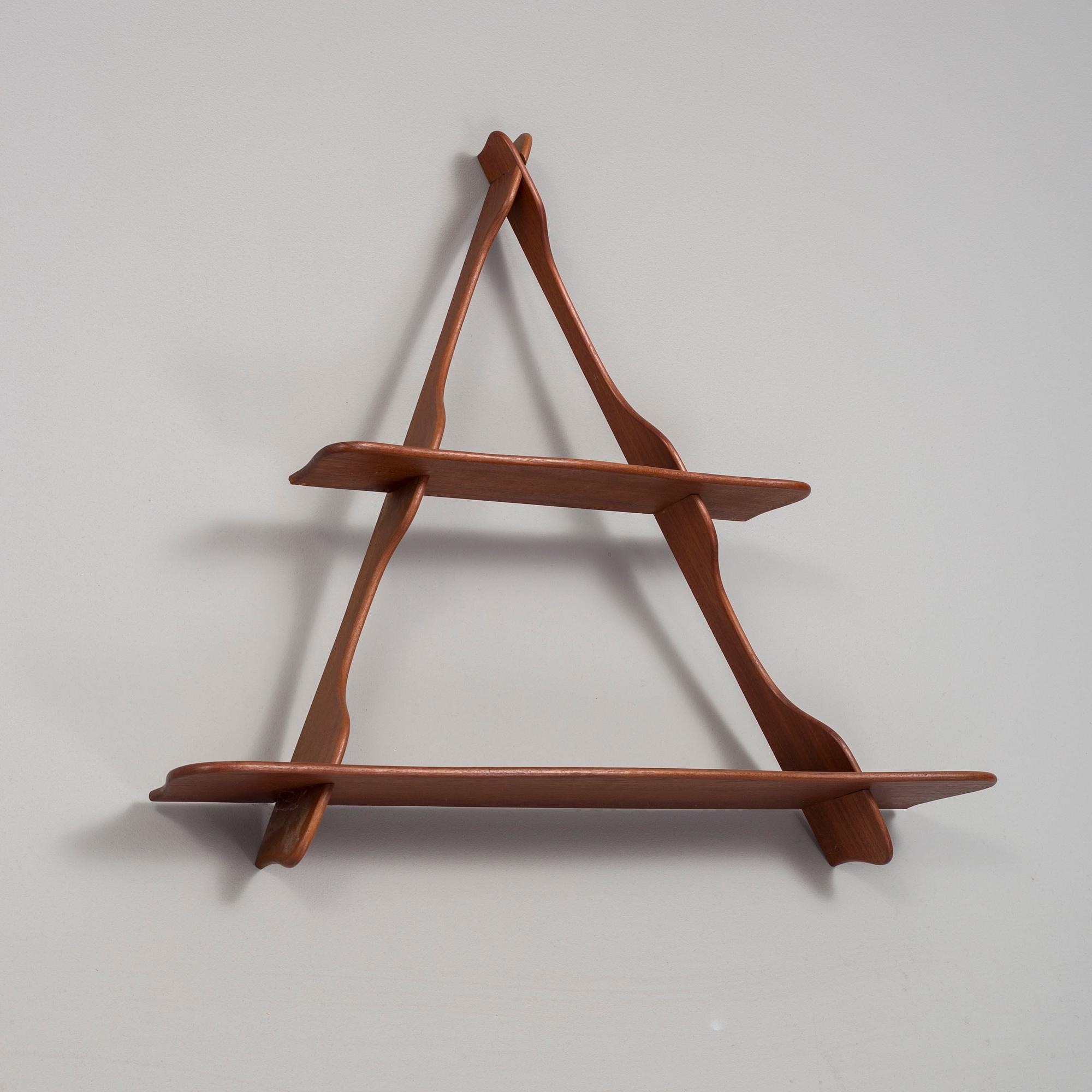 PEDER MOOS, A teak 'Amager' wall shelf, Denmark, mid 20th Century.