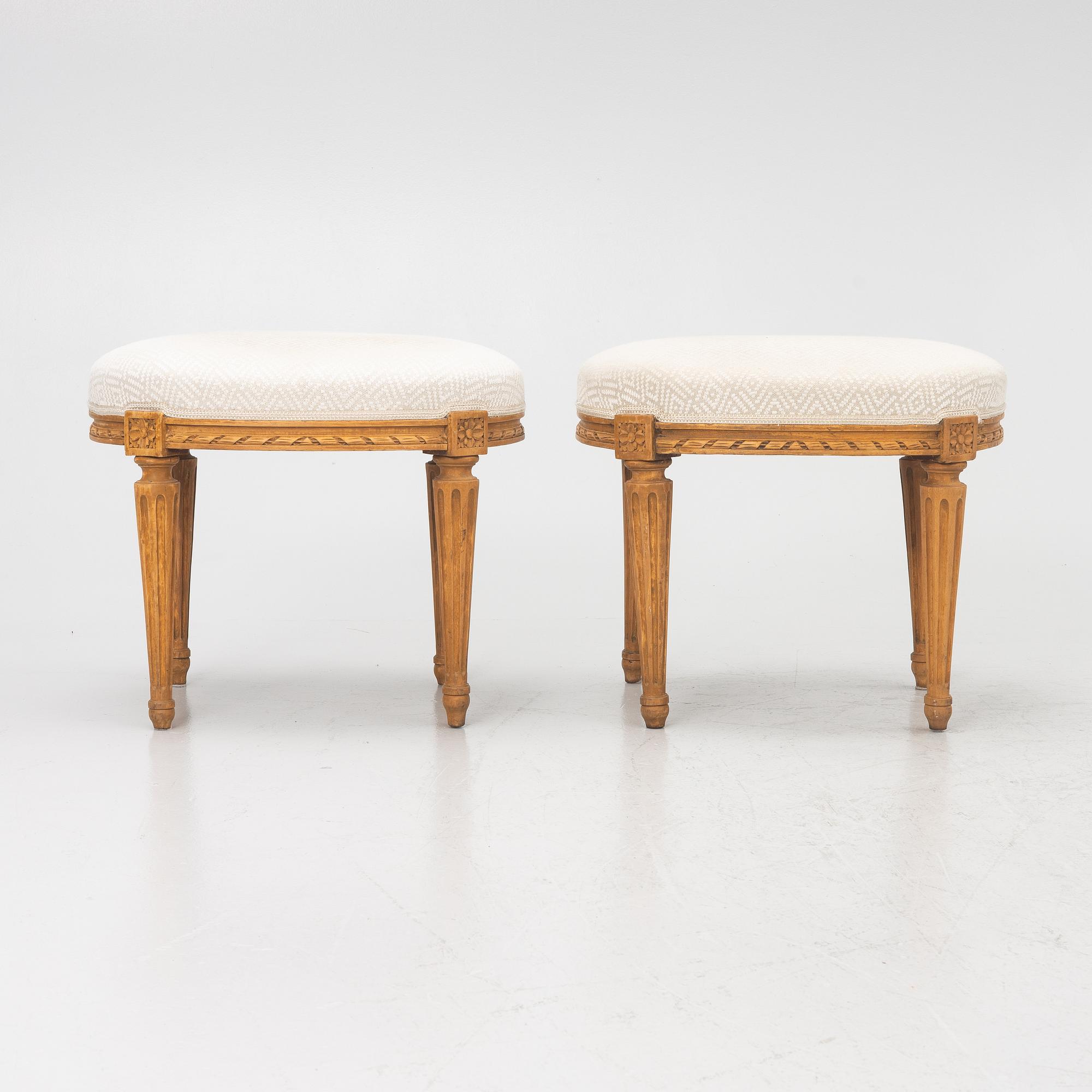 A pair of Louis XVI-style stools, late 19th century.