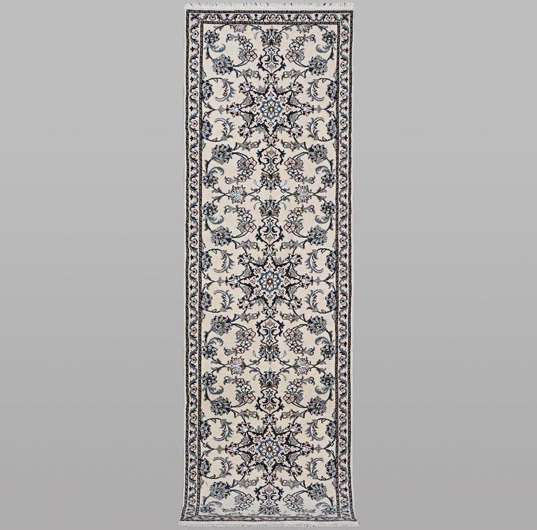A runner carpet, Nain, part silk, ca 289 x 79 cm.