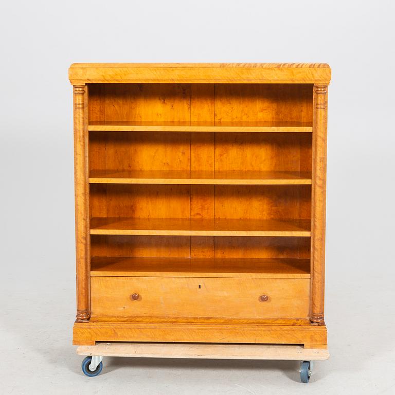 A birch Empire style early 1900s book shelf.