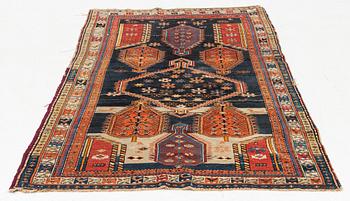 A Caucasian, antique rug, c. 225 x 125 cm.