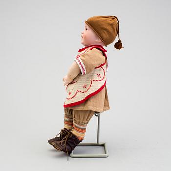 A bisque headed boy doll 235 by S.F.B.J, Paris, France, 1910s.