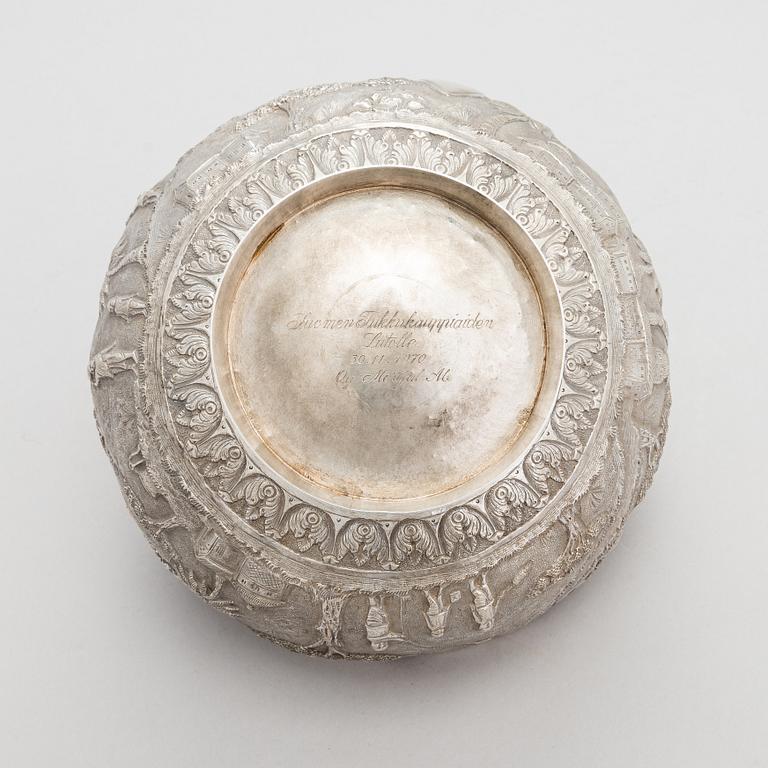 A repoussé silver bowl, mid-20th century.