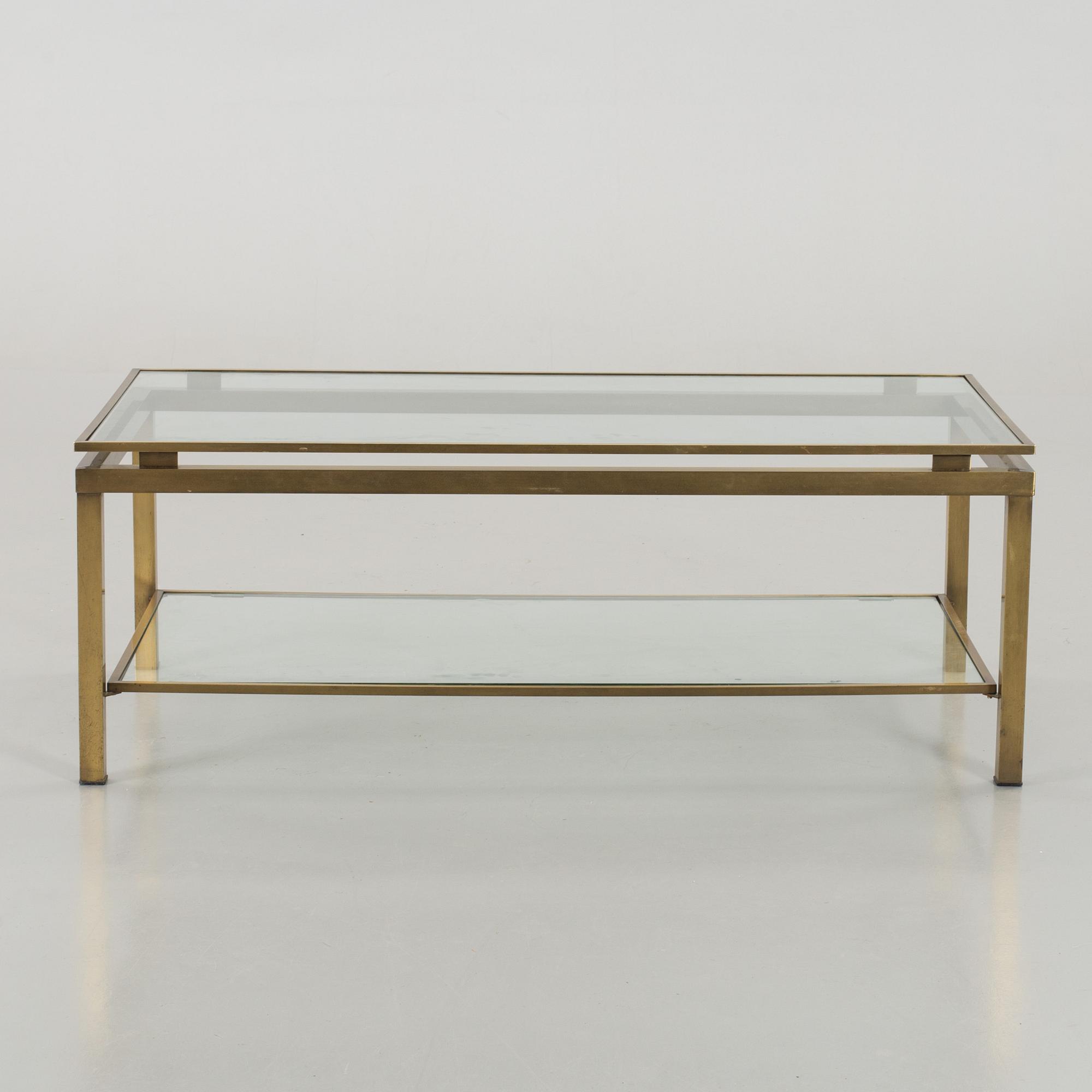 A GLASS TOP COFFEE TABLE, SECOND HALF OF 20TH CENTURY.