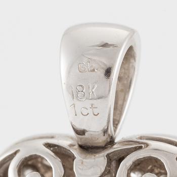 Pendant in the shape of a heart, 18K gold with round brilliant-cut diamonds.