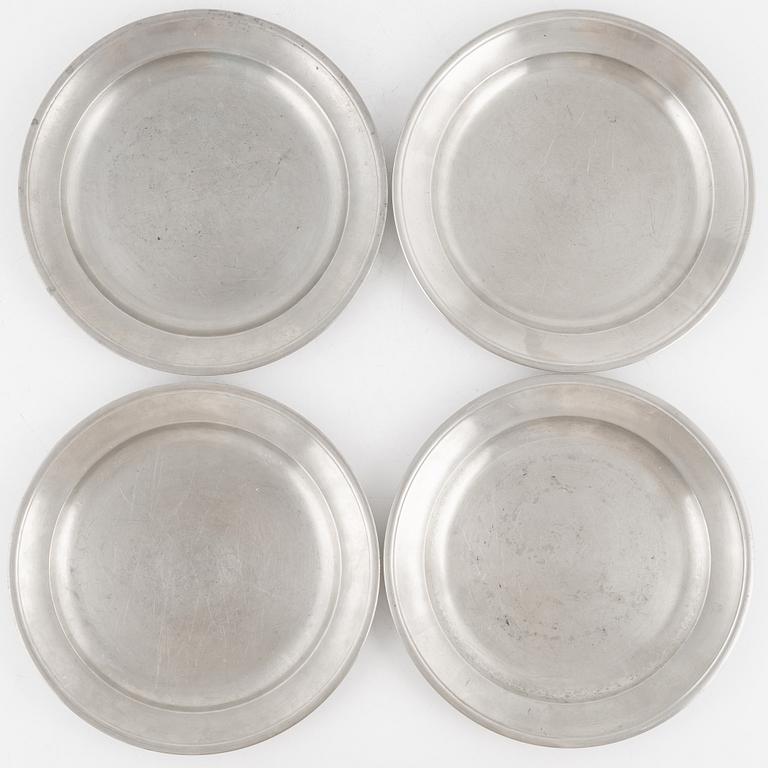 A set of eight pewter side plates, Firma Svenskt Tenn, Stockholm, 1927 and 1944.