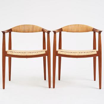 Hans J. Wegner, a pair of teak and rattan 'The Chair', JH-503, Johannes Hansen, Denmark 1950s.
