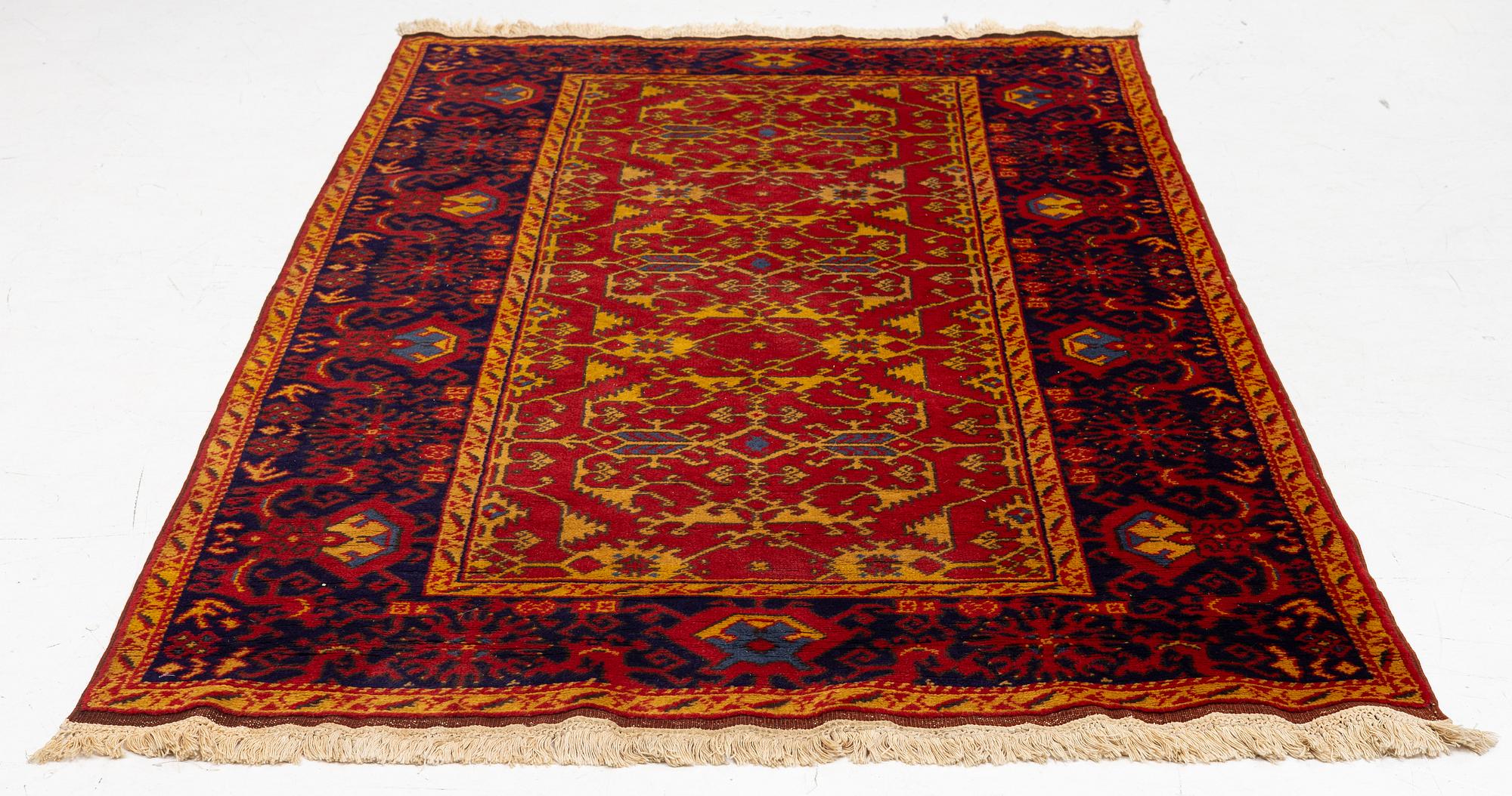 A semi antique Romanian "Lotto" rug, c. 214 x 123 cm.