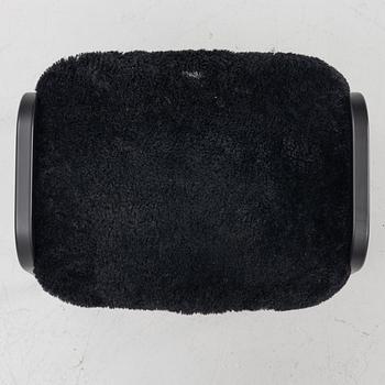 Yngve Ekström, a 'Lamino' easy chair with footstool, Swedese, 2018.