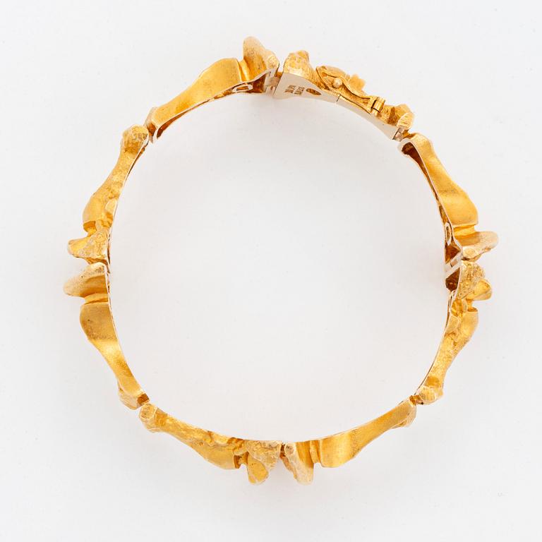 An 18K gold Lapponia bracelet.