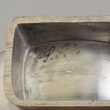 A 1930´s pewter vase and bottle.