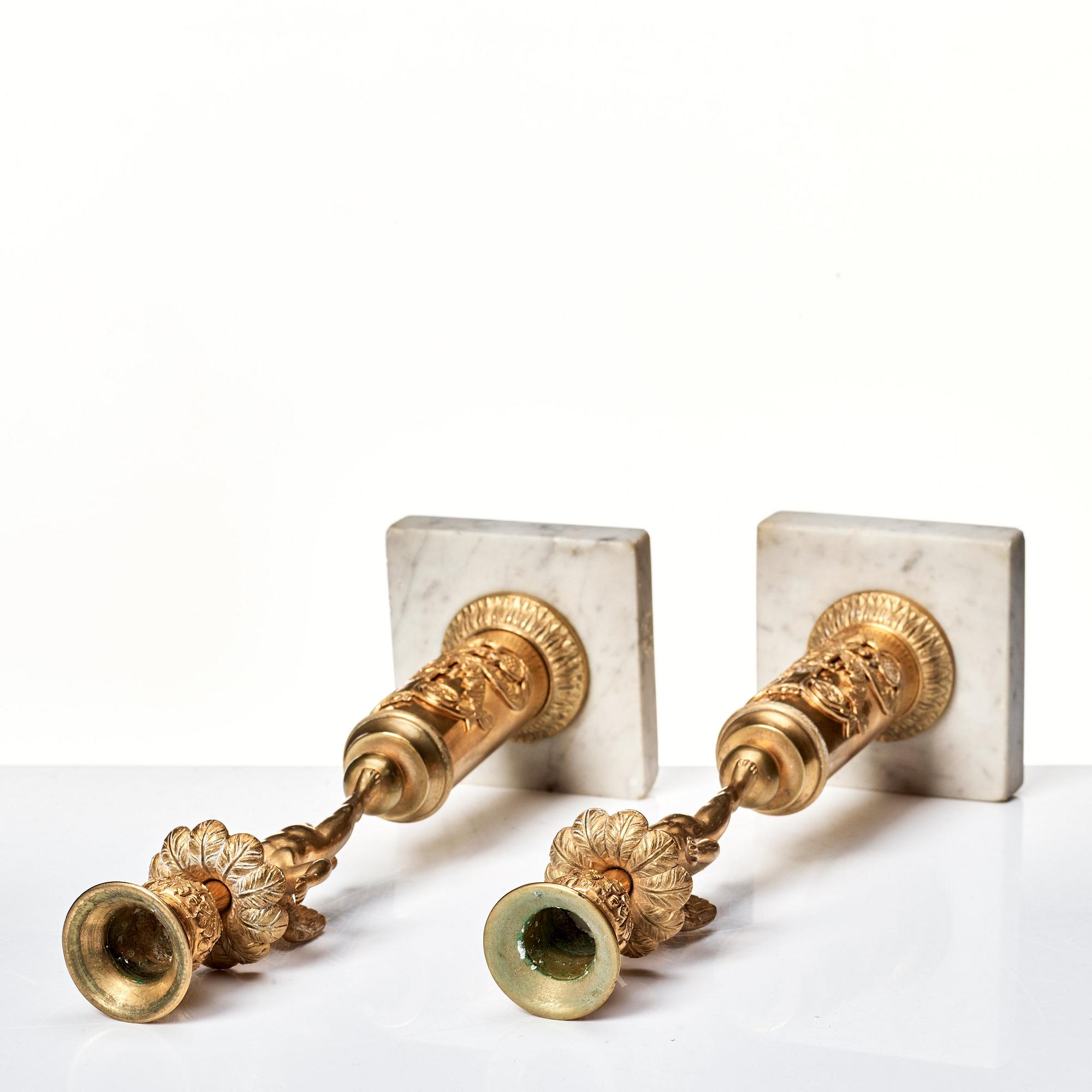 A pair of late Gustavian candlesticks.