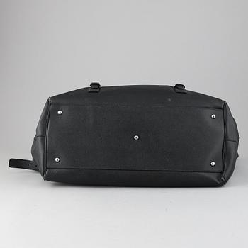 Dolce & Gabbana, a black leather weekend bag.