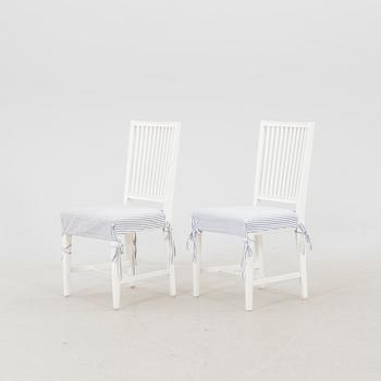 A set of 10 painted Gustavian style chairs from IKEA later part of the 20th century.