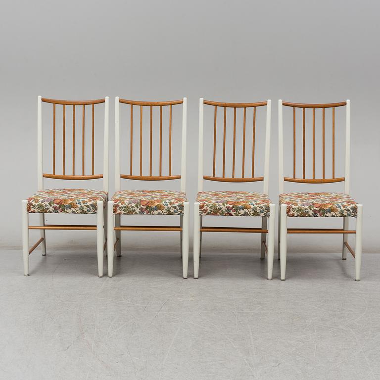 Four '829' chairs by Karl Axel Adolfsson, Gemla with an additional table.