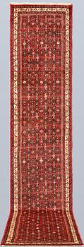 A Hosseinabad runner, c. 386 x 81 cm.