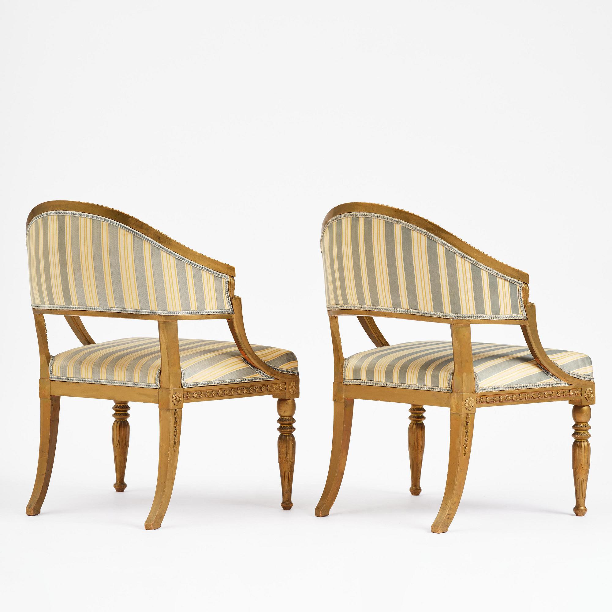 A pair of late Gustavian open armchairs attributed to E. Ståhl (master in Stockholm 1794-1820).