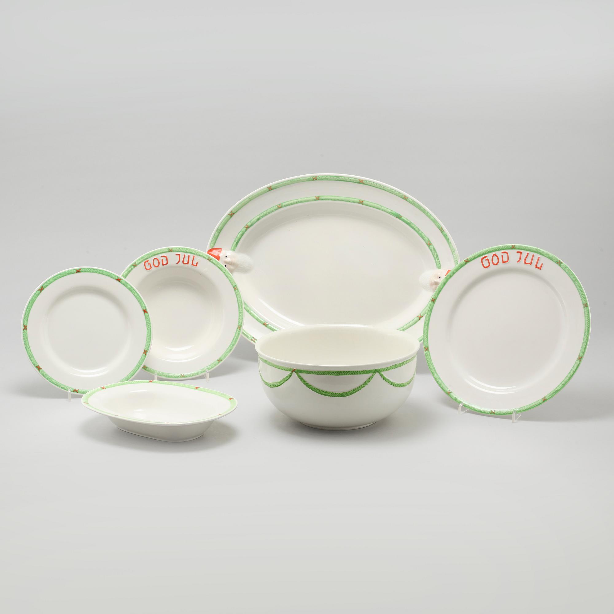 A 20th century set of earthenware tableware of 21 pcs by Gustavsberg.