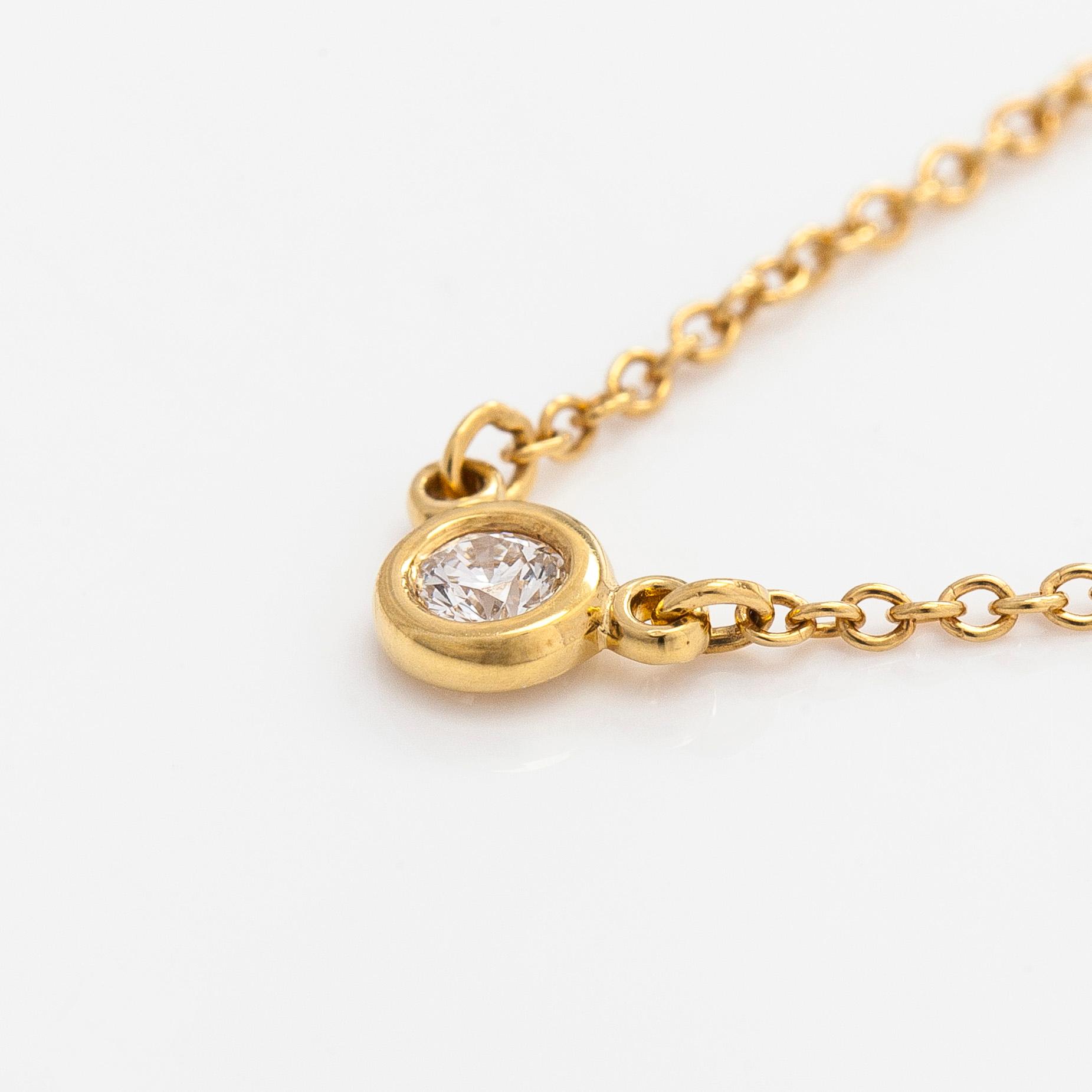 Tiffany & Co, Elsa Peretti, halsband, "Diamonds by the Yard", 18K guld med en briljantslipad diamant.