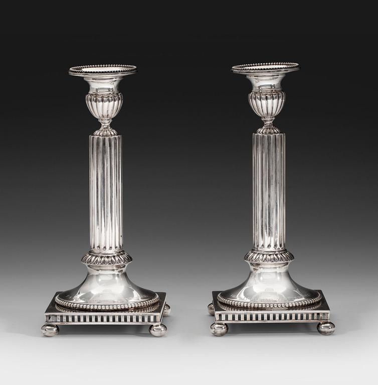 CANDLESTICKS, a pair. Silver GAB Stockholm 1911. Height 20,5 cm. Weight 428 g.