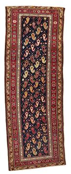 Matto, a runner, an antique Karabagh, ca 268,5-278 x 98,5-103,5 cm.