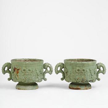 A pair of Swedish cast-iron garden urns, presumably later part 19th century.