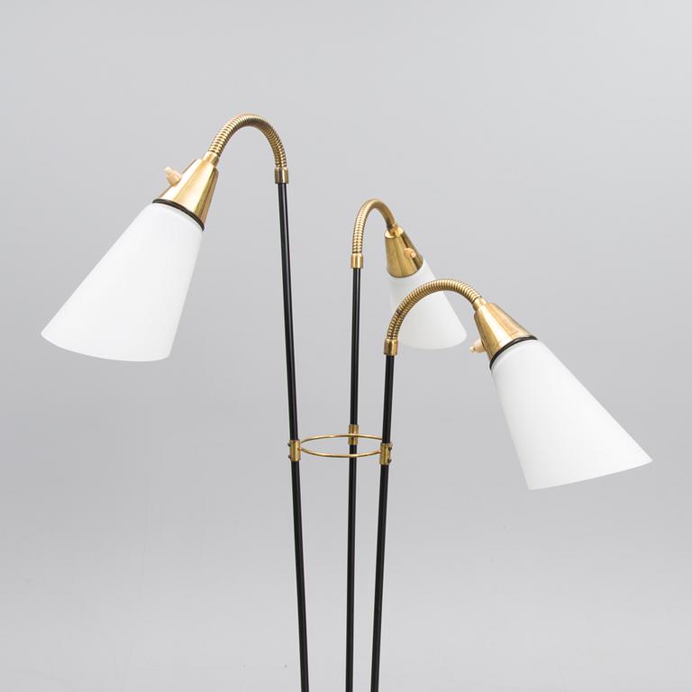 A mid 20th century floor lamp, marked AJH.7.
