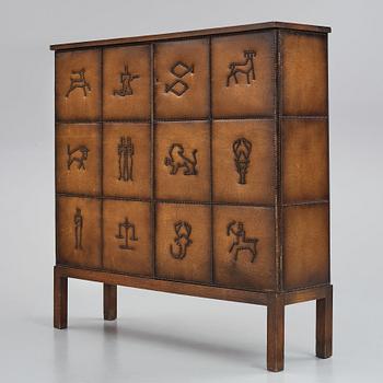 Otto Schulz, a Swedish Modern Zodiac patterned cabinet for Boet, Gothenburg, 1930-1940s.