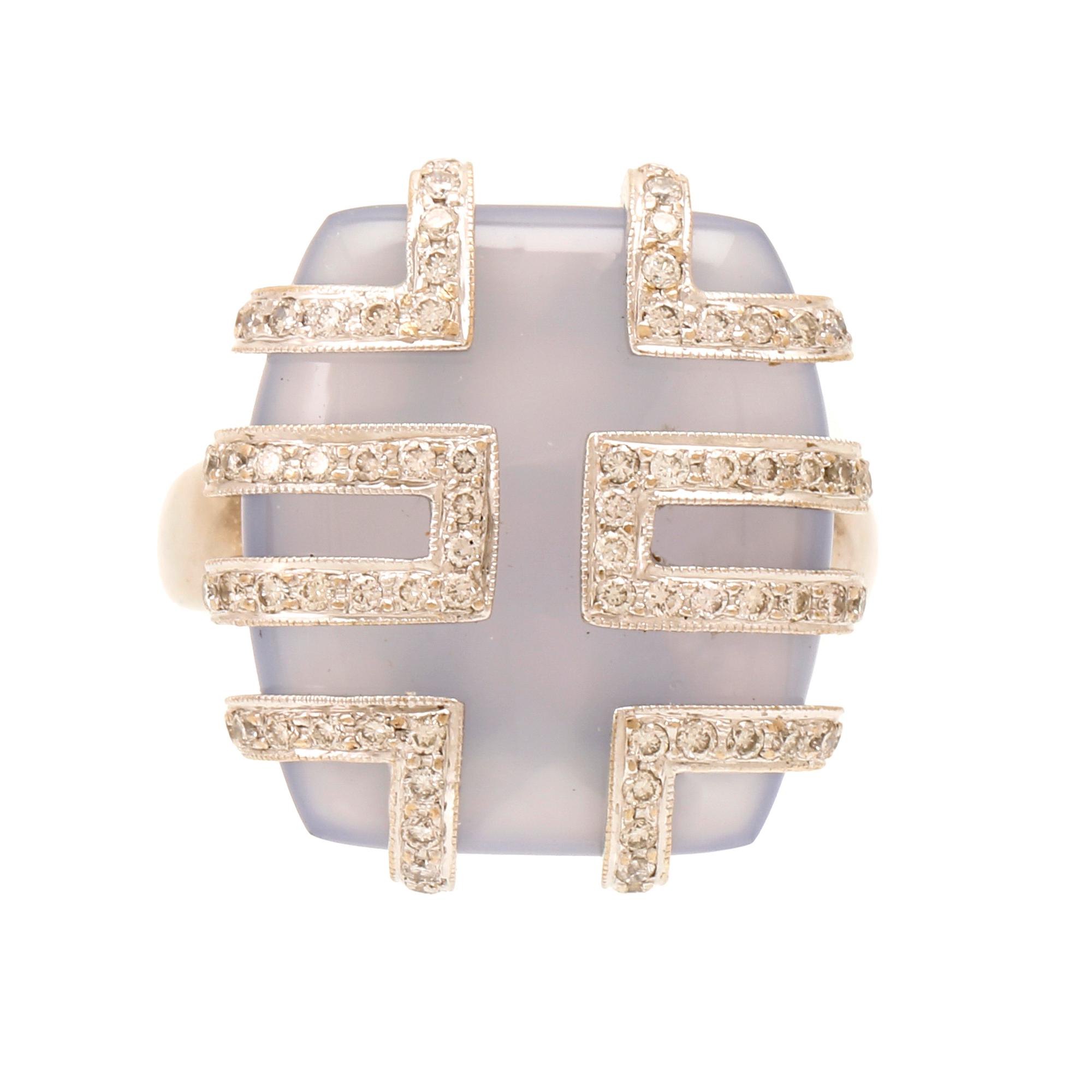 An 18K white gold ring with brilliant cut diamonds and possibly chalcedony.