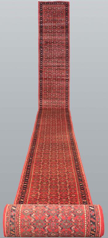 A Hosseinabad runner, approx. 1360 x 80 cm.