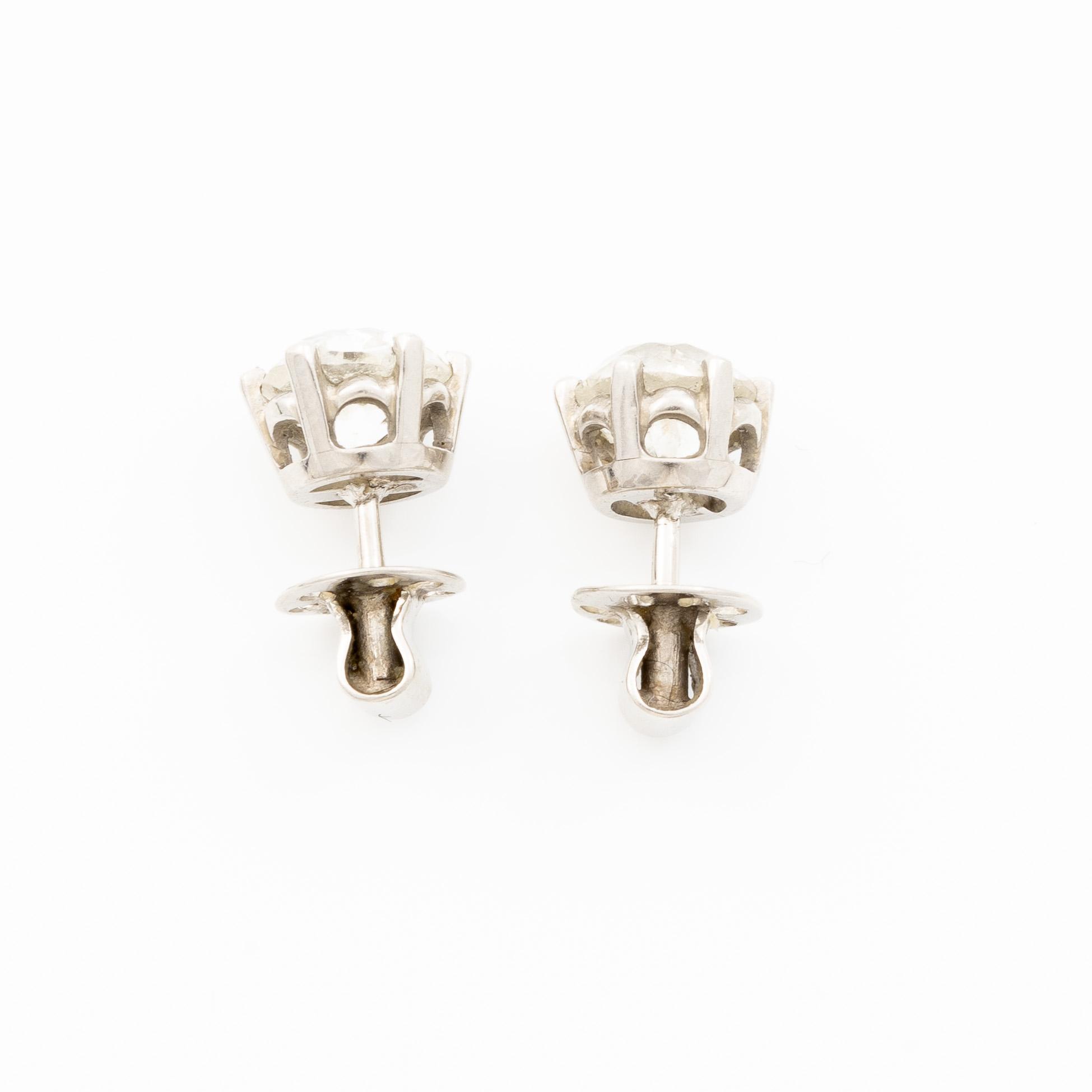 Earrings, a pair, Atelier ajour, platinum with old-cut diamonds.