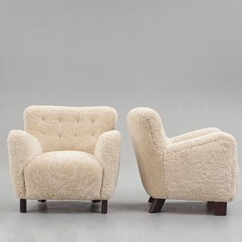 Fritz Hansen, a pair of "1669", easy chairs for Fritz Hansen, Denmark 1940's.