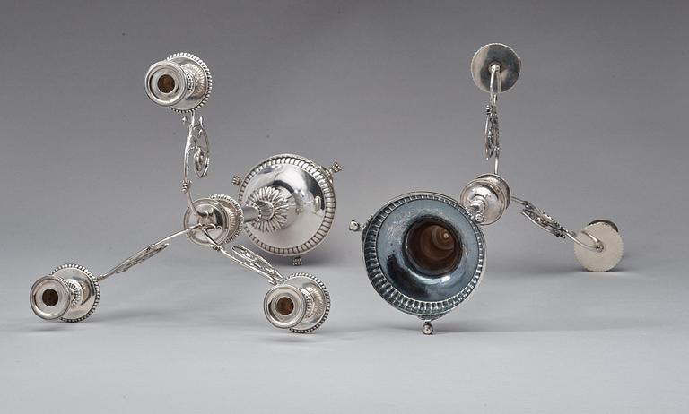 JOHAN-PETTER GRÖNWALL, ett par för tre ljus, Stockholm 1829-1830. kandelabrar, silver, empire.