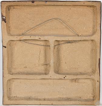 Åke Holm, A stoneware wall relief by Åke Holm, signed.